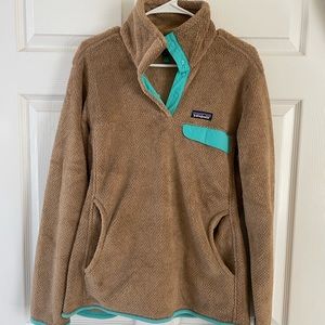 Woman’s Brown with turquoise detail Patagonia fleece pullover. Size L